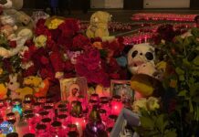 Мемориал погибшим при теракте в «Крокусе» после проведения минуты молчания